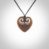 Hand carved heart pendant. Hand made from woolly mammoth tusk. Hand made jewellery for sale online. Rare and unique handmade jewellery. Made by NZ Pacific.